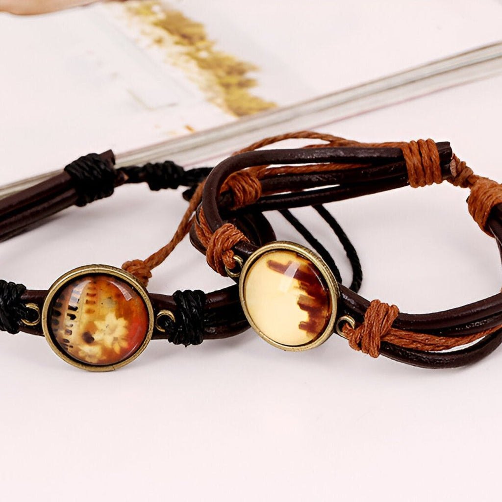 Bracelet en cuir noir et café avec médaillon métallique rond et design flamboyant, modèle mixte Zalen.