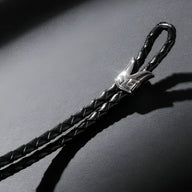 Bracelet homme en cuir noir tressé à double cordon avec tête de loup argentée, modèle Exodia.
