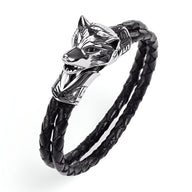 Bracelet homme double cordon cuir noir tressé avec tête de loup argentée détaillée.