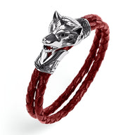 Bracelet homme double cordon cuir tressé rouge avec tête de loup argentée détaillée.