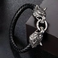 Bracelet noir en cuir tressé avec fermoir tête de loup argenté double face pour homme.