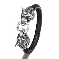 Bracelet homme noir en cuir tressé avec tête de loup argentée double tenant un anneau.