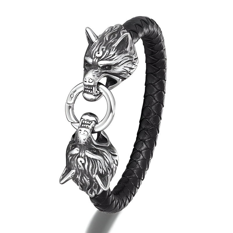 Bracelet homme noir en cuir tressé avec tête de loup argentée double tenant un anneau.