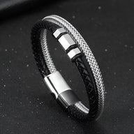 Bracelet homme double tour en cuir noir tressé et acier inox argenté avec motifs géométriques.