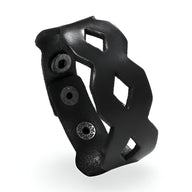 Bracelet en cuir noir large avec découpes géométriques, modèle Yoann pour homme.