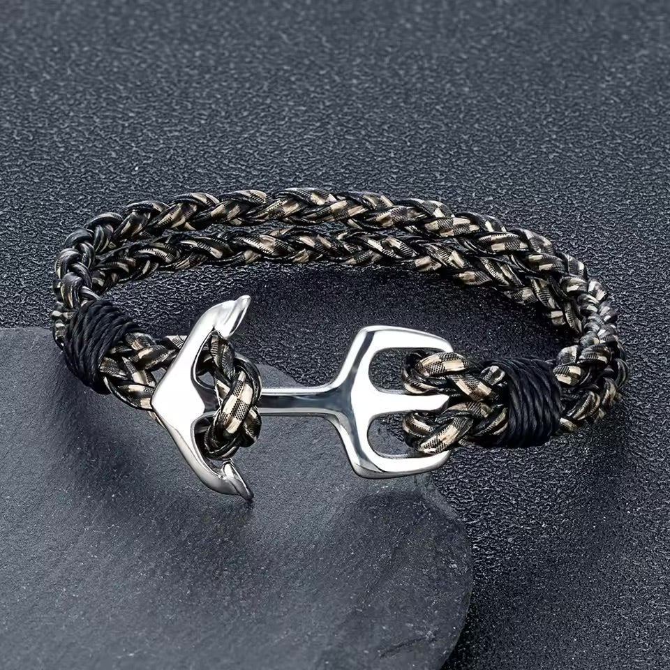 Bracelet marin en cuir tressé noir avec ancre en acier inoxydable argenté, fermoir ancre.