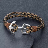 Bracelet en cuir tressé noir et marron avec ancre en acier inoxydable argenté, modèle marin.