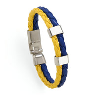 Bracelet mixte en cuir microfibre tressé jaune et bleu avec fermoir métallique argenté.