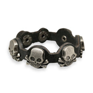 Bracelet noir en cuir avec motifs têtes de mort en métal argenté pour homme, modèle Lioran.