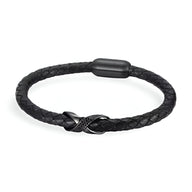 Bracelet masculin en cuir noir tressé avec nœud central en acier noir mat et fermeture magnétique.