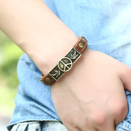 Bracelet en cuir marron avec symbole paix et oiseaux argentés, modèle Birdy, mixte.