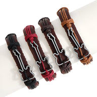 Bracelets en cuir marron avec charm guitare noire et contours blancs, fermetures ajustables.