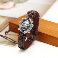 Bracelet en cuir marron avec tête de lion en métal argenté, style masculin robuste.