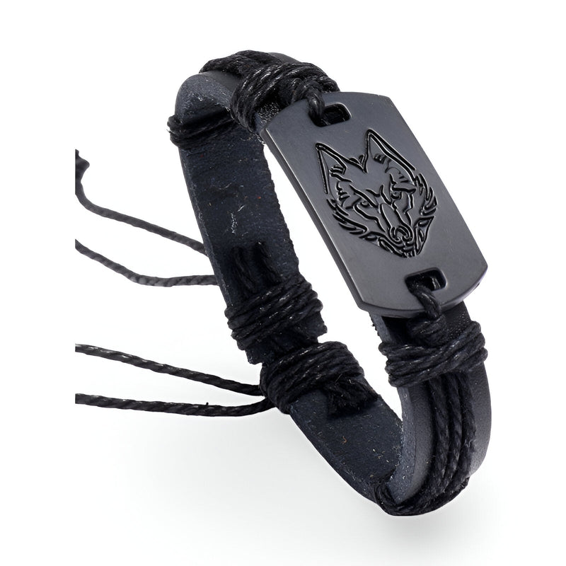 Bracelet en cuir noir pour homme avec plaque métallique gravée tête de loup et cordons ajustables.