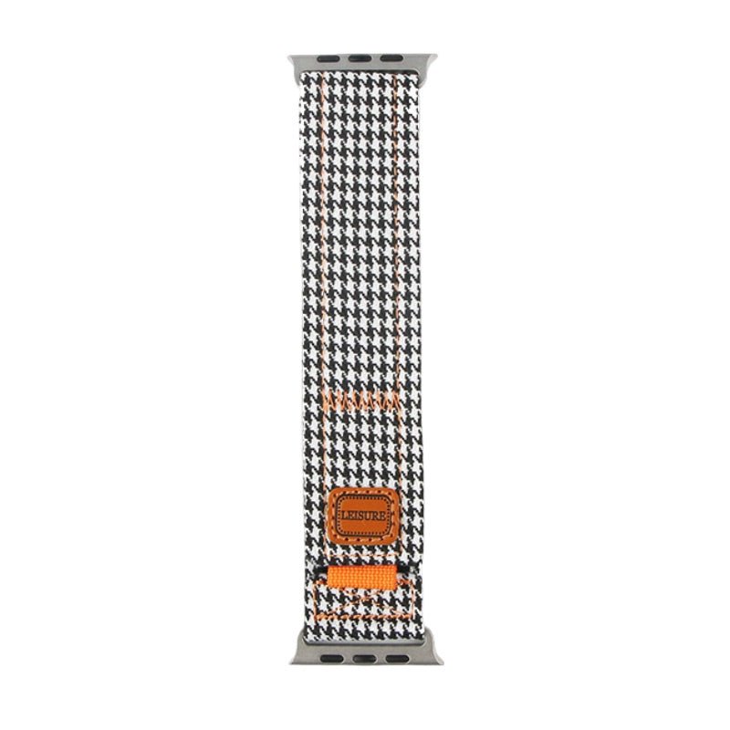 Bracelet pour Apple Watch en tissu à motif pied-de-poule noir et blanc avec détails cuir orange.