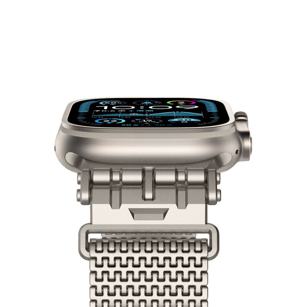 Bracelet pour Apple Watch argent en maille épaisse, ajustable et connecteur magnétique visible.