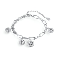 Bracelet en acier inoxydable argenté avec maillons épais et pendentifs arbre de vie sous forme de médaillons circulaires.