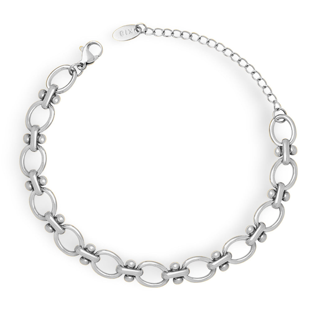 Bracelet en maille marine en titane plaqué argent avec fermoir mousqueton et chaînette ajustable.