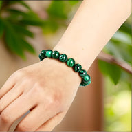 Bracelet mixte en malachite verte polie, perles rondes aux motifs naturels, modèle Arden.