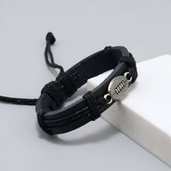 Bracelet noir en microfibre avec badge métal Rugby, style masculin ajustable par cordon.