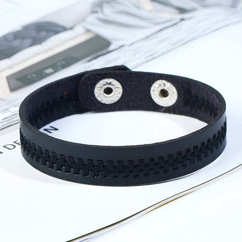 Bracelet homme noir en microfibre tressée avec fermeture pression métallique silver.