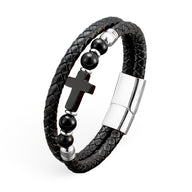 Bracelet homme en microfibre noir tressé avec croix chrétienne en pierre noire et fermoir métallique argenté.