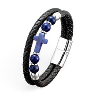 Bracelet homme en microfibre noire tressée avec perles bleues lapis lazuli et croix en pierre bleue, fermoir métallique.