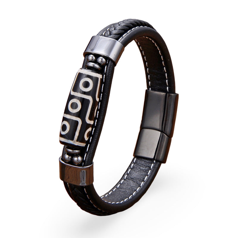 Bracelet homme microfibre noir avec motif tibétain argenté et fermoir magnétique noir mat.