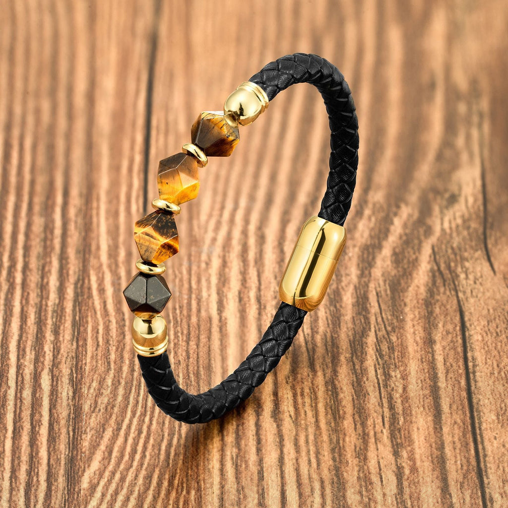 Bracelet homme en microfibre noire tressée avec pierres naturelles œil de tigre et fermoir doré magnétique.