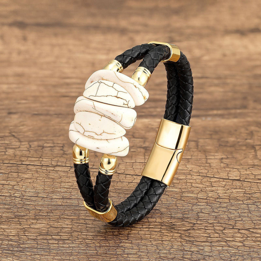 Bracelet homme microfibre noir tressé avec pierres turquoise blanches et accents dorés.