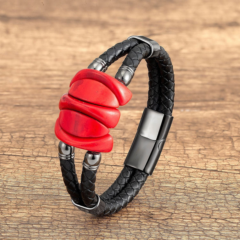 Bracelet homme microfibre noir, orné de trois pierres rouges arrondies, fermoir métal argenté.