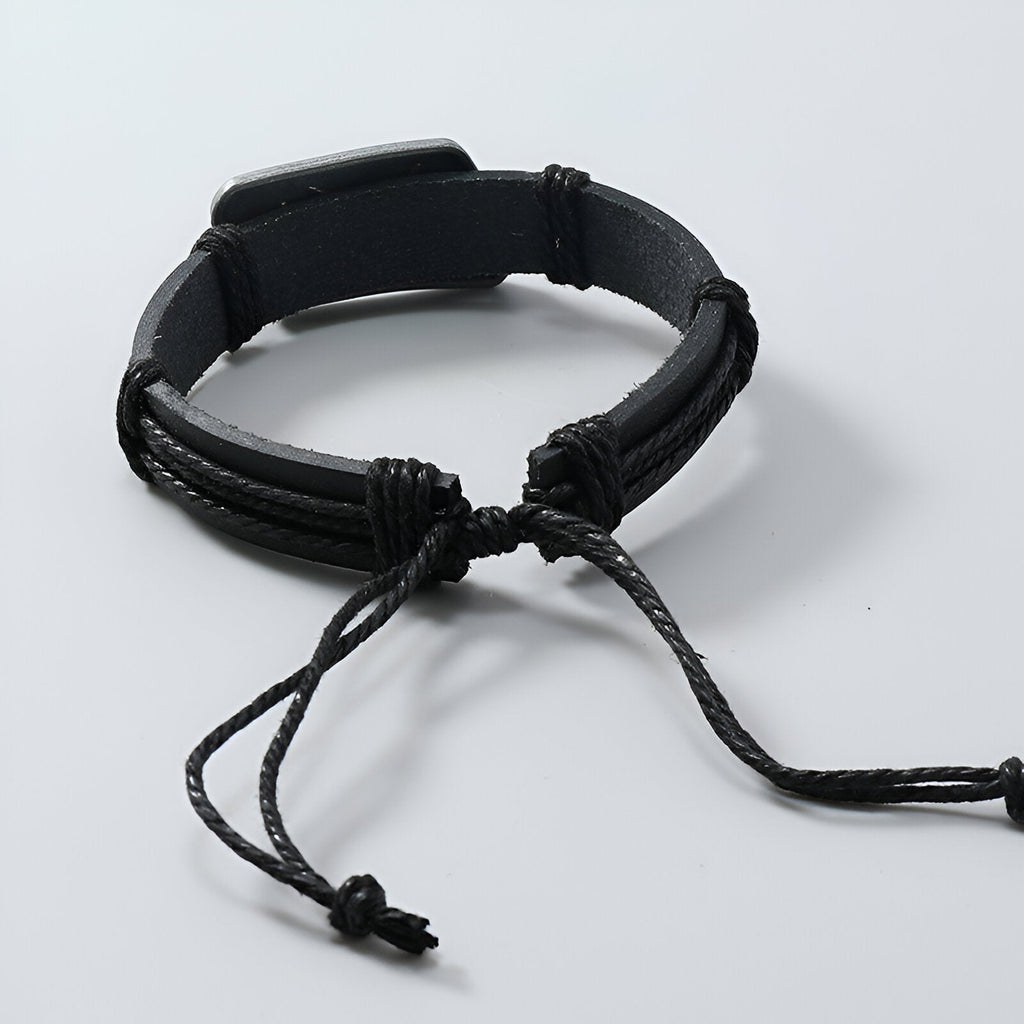 Bracelet homme en microfibre noir avec cordon réglable et doublure douce.
