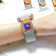 Bracelet Apple Watch en nylon gris à rayures avec étiquette orange ajustable modèle Dacota.