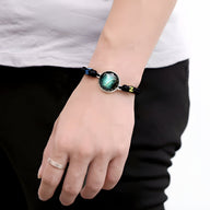 Bracelet en nylon noir avec médaillon vert signe du zodiaque Bélier, style mixte Nova.