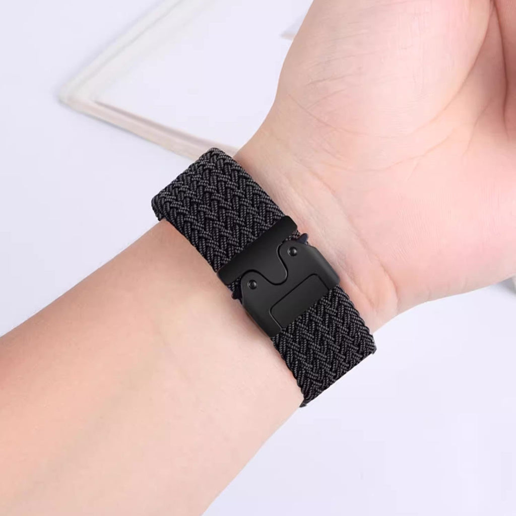 Bracelet en nylon tissé noir avec boucle tactile pour montre Huawei, style robuste et moderne.
