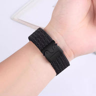 Bracelet en nylon tissé noir avec boucle tactile pour montre Huawei, style robuste et moderne.