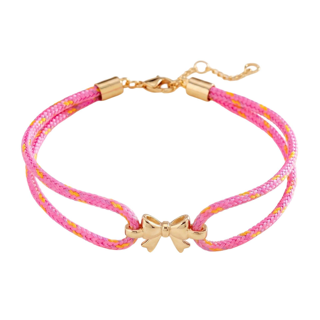 Pulsera de nailon trenzado con charm de lazo dorado, accesorio femenino ajustable y refinado, ideal para un look chic y espontáneo, modelo Rubane