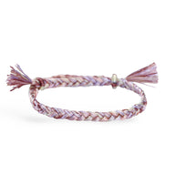 Bracelet femme en nylon tressé rose, lavande et beige avec fermoir coulissant argenté.