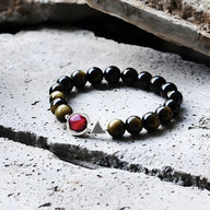 Bracelet mixte en perles d'obsidienne noire et œil de tigre avec médaillon rond rose éclatant en acier.
