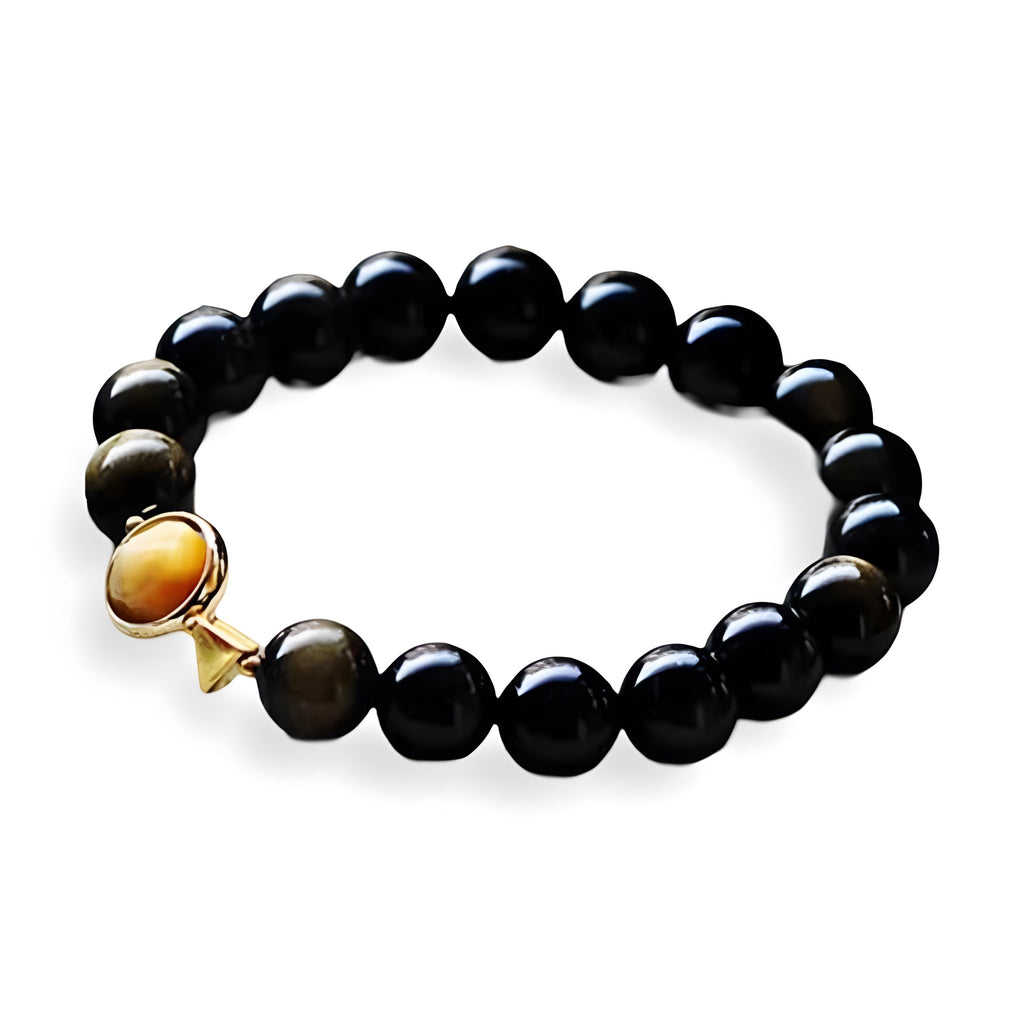 Bracelet mixte en perles noires d'obsidienne avec perle œil de tigre jaune et étoile dorée.