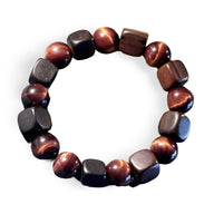 Bracelet mixte en perles rondes œil de tigre rouge et cubes en bois d'ébène noir mat.