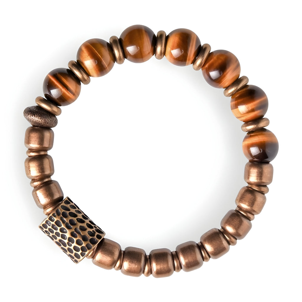Bracelet femme en perles d'œil de tigre marron et cuivre brossé avec détail texturé.