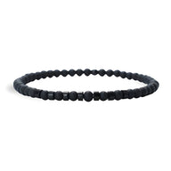 Bracelet fin pour homme en onyx noir mat avec perles rondes et facettées.