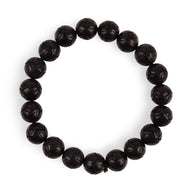 Bracelet élastique en perles rondes de bois d'ébène noir lisse pour homme ou femme.