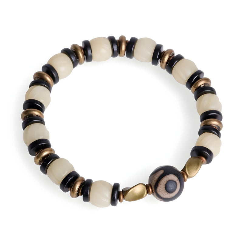 Bracelet femme perles blanches d'os de yak et bois d'ébène noir avec détail cuivre circular.