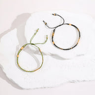 Bracelet double rang en perles noires, beige et or avec fermoir réglable, style Anola, femme  .