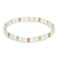 Bracelet femme perles japonaises vertes avec accents orange et dorés effet mosaïque.