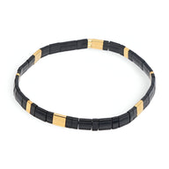 Bracelet femme en perles japonaises noires et dorées, modèle Hitomi, style minimaliste.