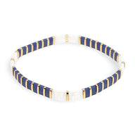 Bracelet femme bleu en perles japonaises avec intercalaires blancs et dorés, modèle Honoka.