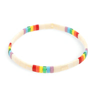 Bracelet femme perles du Japon multicolores alternant ivoire, rouge, vert et violet.